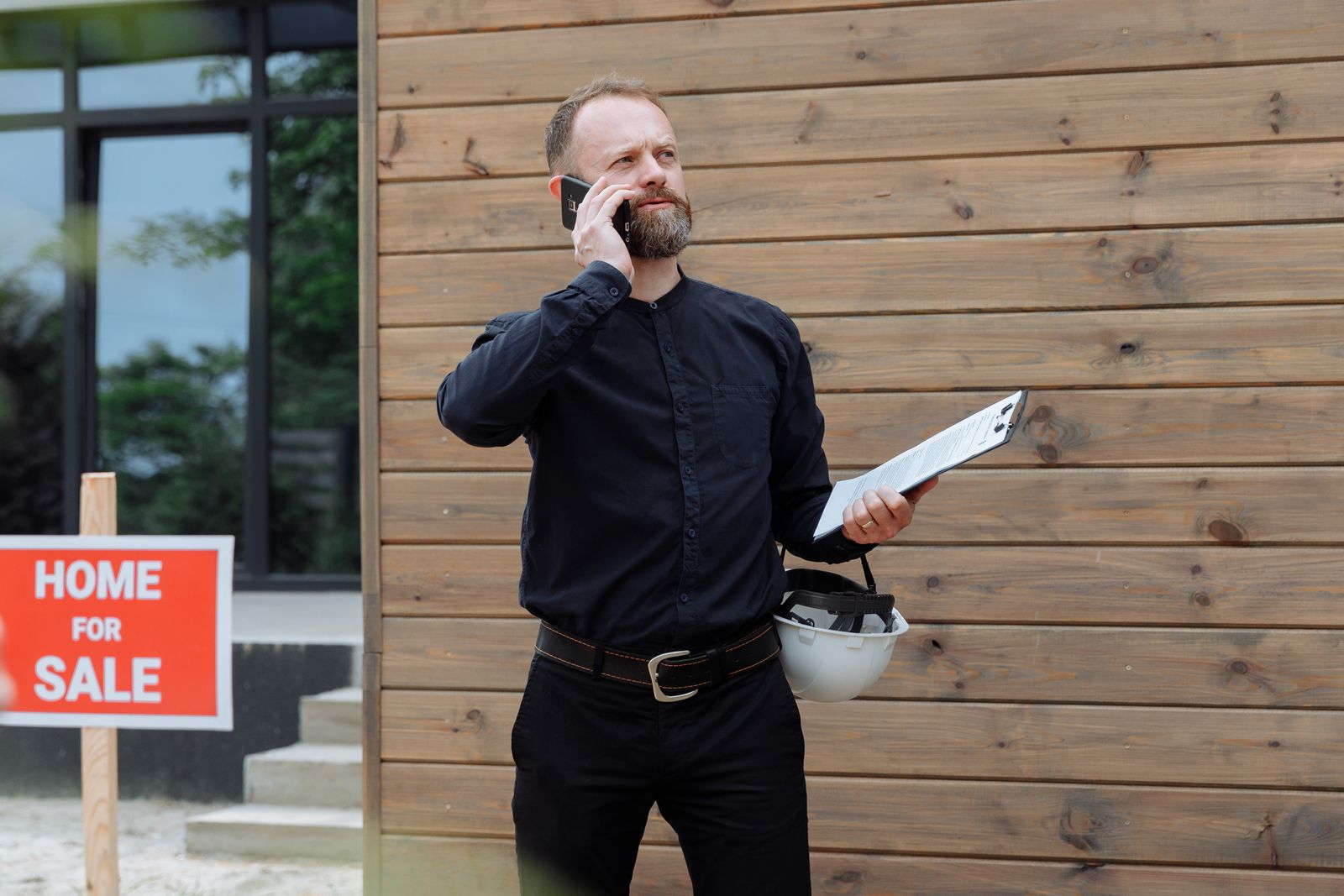 Real estate consultant reviewing an inquiry with a buyer